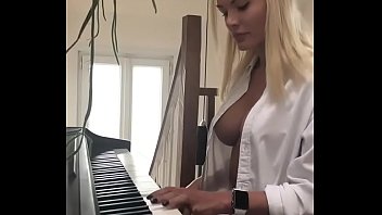 Cleavage Playing Piano